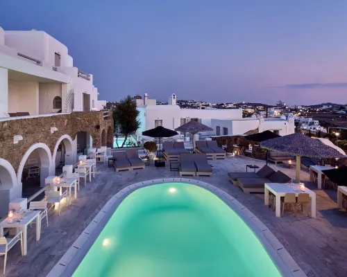 Paolas Town Hotels near Glam Club