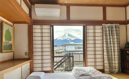 Guest House En Отели рядом со станцией Kotobuki Railway Station