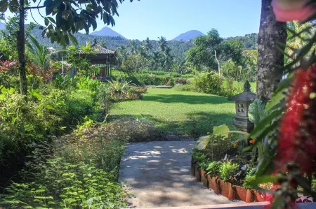 Amartya Puri Green Cottages Отели рядом с достопримечательностью «Роуз гарден»