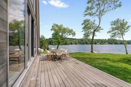 Lakefront Haven /  Private Dock • Fire Pit • EV Charger