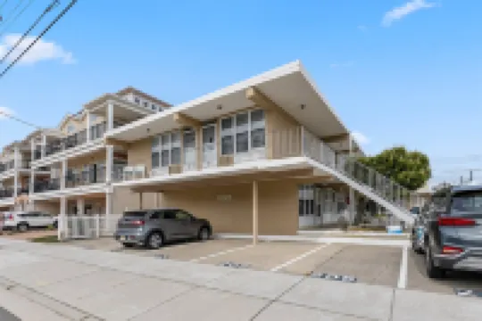 Outdoor Pool and Grilling Area - Charming Coastal Oasis