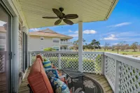 Balconies Overlooking Water and Golf Course - Cozy Beach Haven