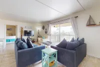 Bayfront condo close to beach with water views & pool access Hotels near Beach Waterpark