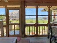 Waterfront Views and Shared Pool - Modern Coastal Retreat