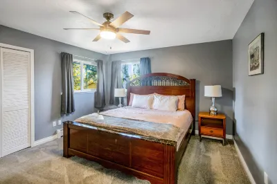 Dog-friendly home with a fenced yard, putting green, & shared washer/dryer