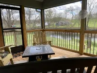 Wood Haven on the River- cozy cottage on the Hiawassee River in Hayesville NC
