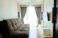 Homey and Cozy 2Br Apartment at Tamansari la Grande
