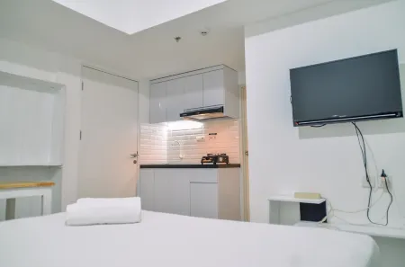Minimalist Studio Room at Urbantown Serpong Apartment