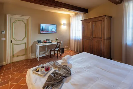 Agrisuite le Querce del Vareglio Отели в г. Монтеу-Роэро