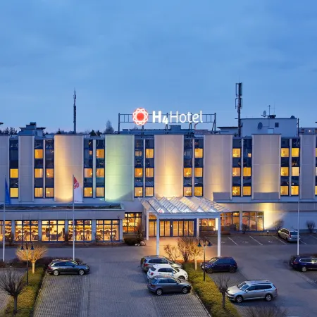 H4 Hotel Leipzig Отели рядом с достопримечательностью «Зюдост»