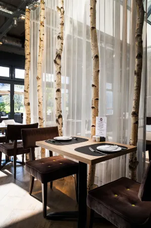 Ginn Hotel Berlin Potsdam Отели в г. Клайнмахнов