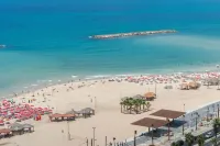 Chic Urban Getaway with Balcony & Mamad by Sea N Rent