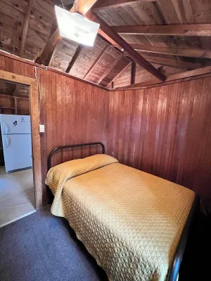 Rustic View Cabin sits on a 2.5 acres on beautiful Hubbard Lake.