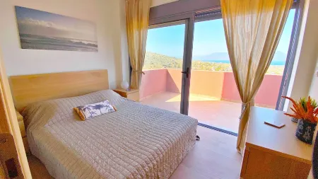 Minimalist, new condo with beautiful sea and mountain views