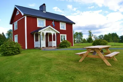 Outdoor place with furniture and barbeque, boat in lake Hotels near 32Nässjö Mosque