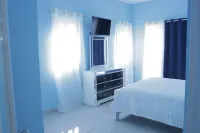 A modern 2-bedroom villa with pool and lounge area