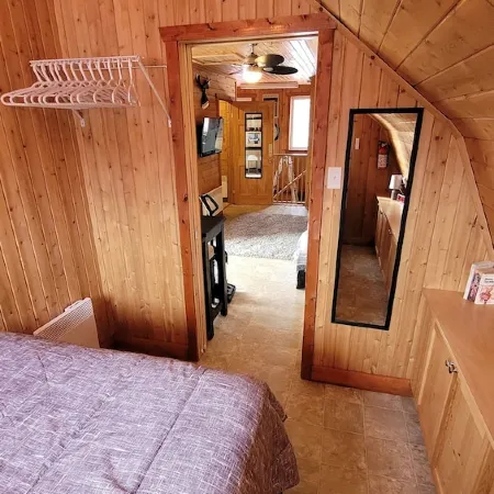 Modern Costa Del Sol Flat Overlooking Pokemouche River, with swimming off dock.