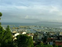 Apartment in seafront location with pool and garden with lawn,