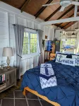 Charming bungalow over a coral reef in the Caribbean sea with stunning sunsets!