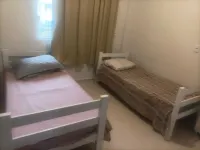 GROUND FLOOR APARTMENT/SEASIDE APARTMENT-COVERED barbecue. Enjoy the place with shower.Lagoon.Dunes