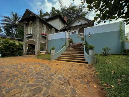 "Thalimala Bungalow, Experience A Vintage Colonial Charm in a Tea-Scaped Haven"