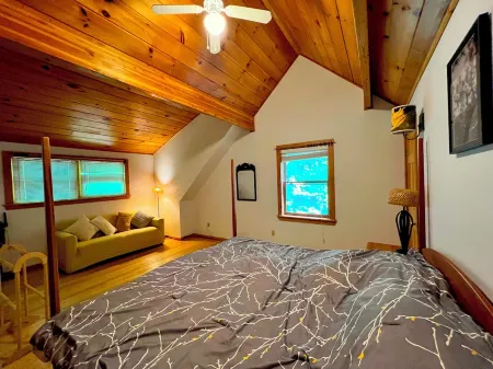 3Br Riverfront Log Home with Steam Sauna, Soaring Glass Wall & Private Forest