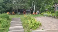 Your Own Private Beach Lakefront Cozy Cottage in a Peaceful Bay on 5 Lake Chain.