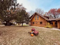 Gorgeous XL Log Cabin in Bloomington, IL! 2 Game Rooms + Hot Tub & Sauna!
