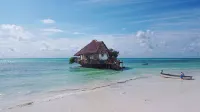 Pingwe Beach Apartments - Meerblick