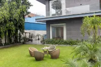 ELIVAAS Signature DSG Farm 3BHK with Bar - Villas