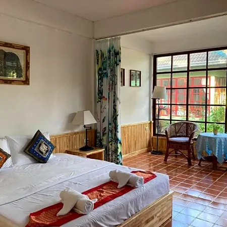 Ekman Garden Resort Отели рядом с достопримечательностью «Wat Chedi»