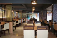 Adyar Plaza Inn by Rak Rooms, Mangaluru فنادق في Dakshina Kannada