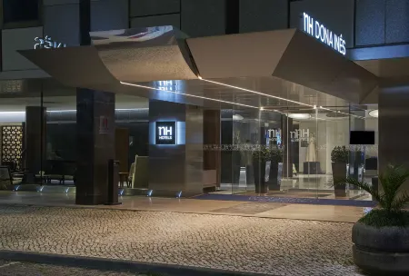 NH Coimbra Dona Ines Отели рядом с достопримечательностью «Baroque Library - University of Coimbra»