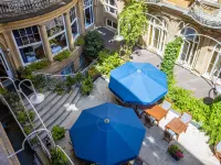 Radisson Blu Schwarzer Bock Hotel Wiesbaden Отели рядом с достопримечательностью «Вестенд»