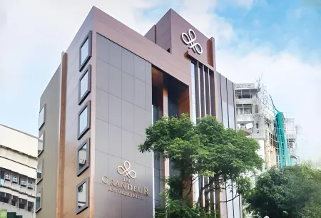 The Grandeur Boutique Hotel Отели рядом с достопримечательностью «Мандапешвар Кейвс»