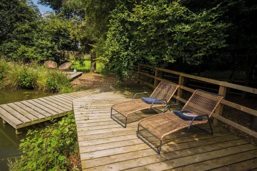 Woodland Cabin with Private Lake, Sauna + Fire Pit