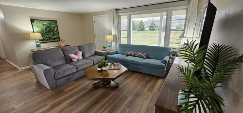 Relax and unwind in this colorful home close to hospitals and colleges! Hotels in Perry Township