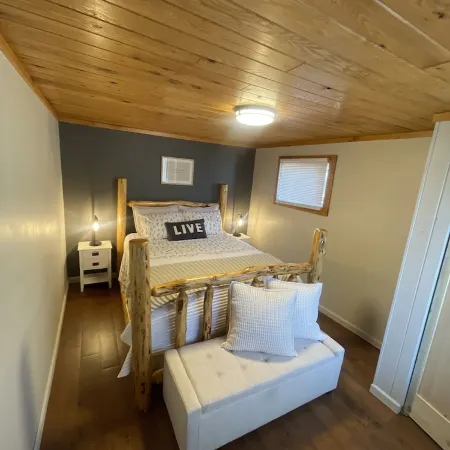 Cozy cabin right on the water! All bikers, skiers, fisherman and more welcome!