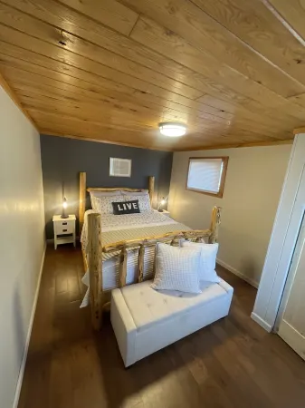 Cozy cabin right on the water! All bikers, skiers, fisherman and more welcome!