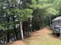 Peaceful Lakefront Cabin at Woodslands on the Lake with Shared Beachfront