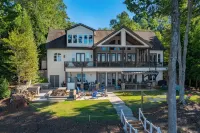 Top Rated Luxury 8-bedroom house with Best Boathouse on Lake Gaston. Hotels in Sixpound
