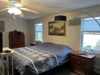 Lovely home near beaches. Ample yard with patio with enclosed porch & hot tub.