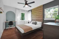 Mid-Century Boho Chic home with Pool, Game Room & Outdoor Playhouse.