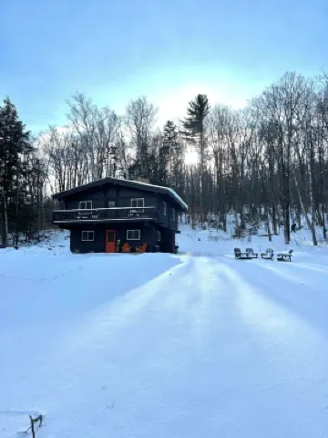 Pet-Friendly Winter Retreat in the Woods with Fireplace Near Okemo + Killington