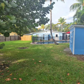 Lagoon shaped pool home with private back yard!