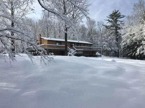 Atv-Snowmobile Trail, sits on the Laughing Whitefish River, sleeps 16 people.