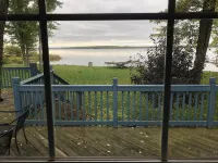 See the best of Michigan's Upper Peninsula in this Family Ready Lake-side Cabin