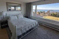 Enjoy elegant comfort with breathtaking water views on grand property