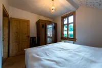 Landhaus Kunterbunt at the forest and river with chicken and sheep in the Thuringian Forest