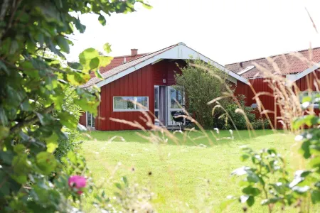 Ferienhaus "sanderling" - Gemütliches Holzhaus mit Blick auf die Schafswiesen